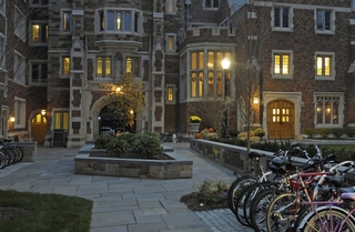 The exterior of Grace Hopper College in the evening